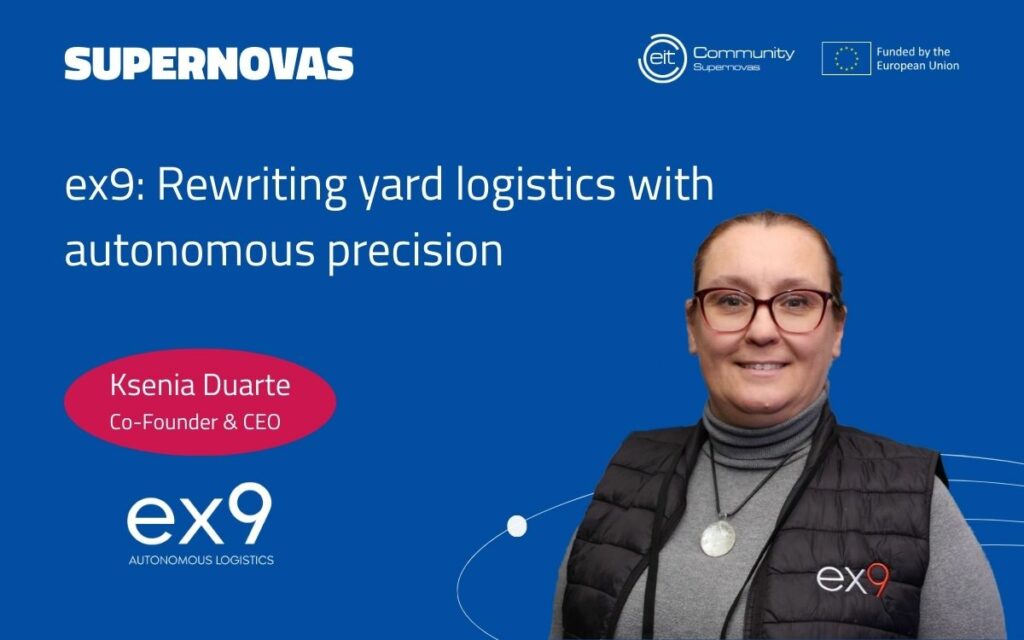 Lady with vest looking into the camera.